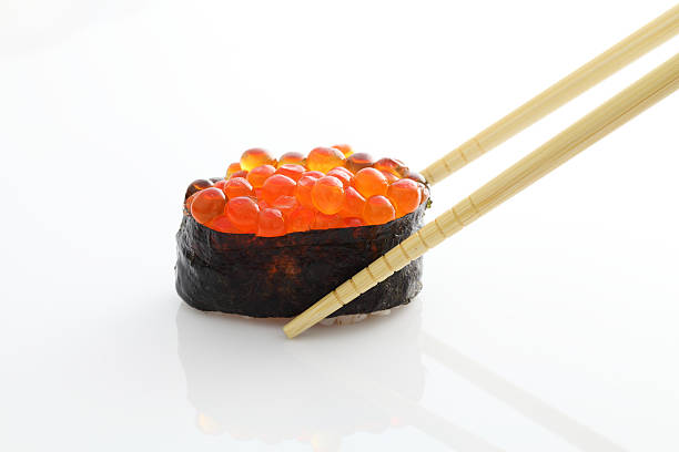 istock Salmon egg on sushi nigiri roll 178902506