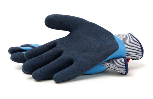 paar blaue arbeitshandschuhe aus textil mit schützender gummischicht - arbeitshandschuh stock-fotos und bilder