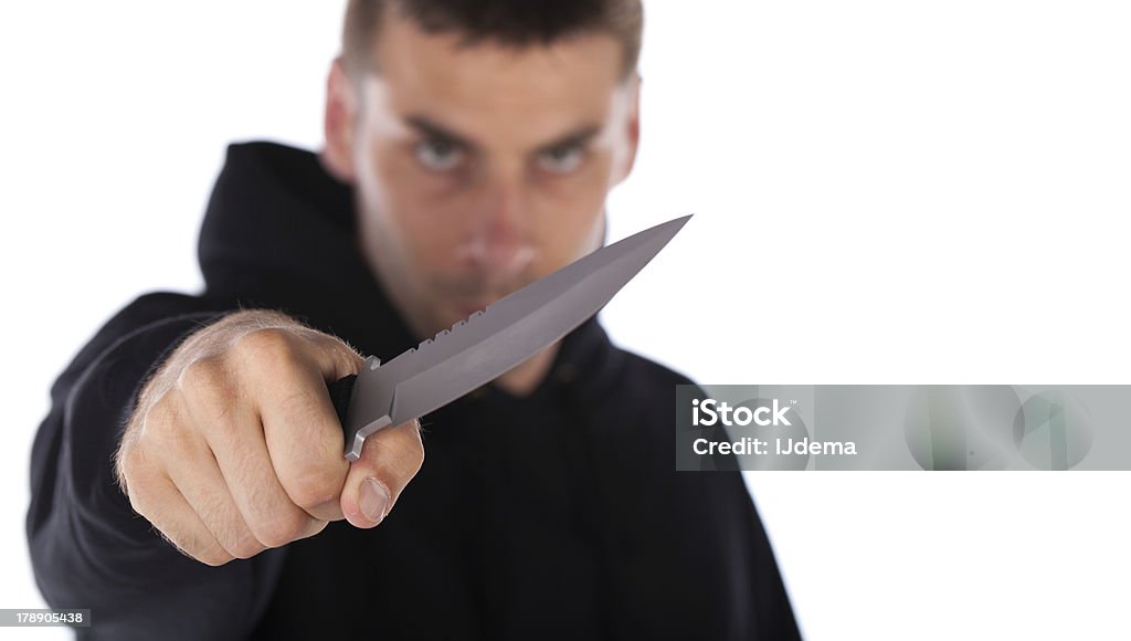 Человек, угрожая с нож - Стоковые фото Агрессия роялти-фри