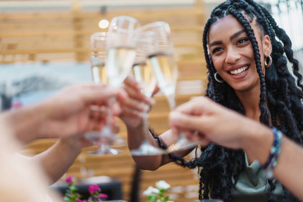 istock Joyful Toast with Friends Outdoors - Group cheers at social gathering 1789054820