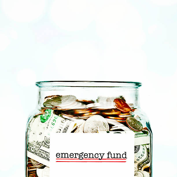 istock Emergency Fund Jar Filled with American Money 178907125
