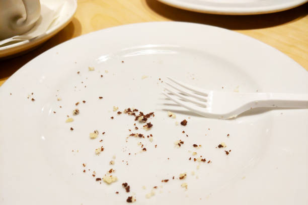 istock Dirty white plate after eating in a restaurant. 1789073531