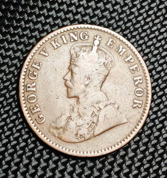 istock a silver coin sitting on top of a black surface covered in a cloth 1789126348