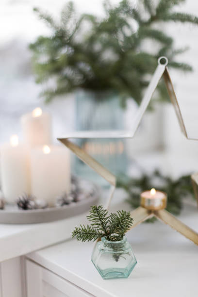 istock Bouquet of spruce and burning candles 1789129572