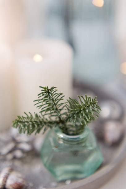 istock Bouquet of spruce and burning candles 1789130089