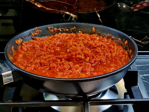 carrots fried in a frying pan for gravy