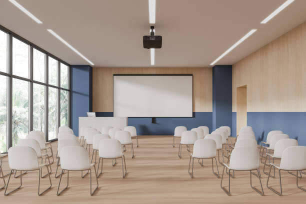 istock Blue and wooden lecture hall interior with projection screen 1789145510