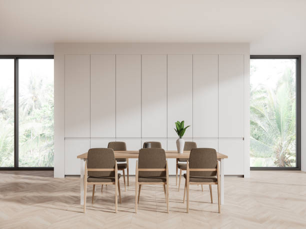 istock White meeting room interior with eating table and seats, panoramic window 1789151506