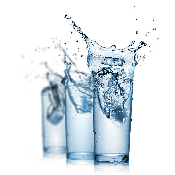 istock Splash of water in glasses 178915455