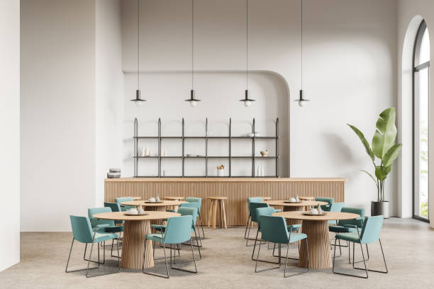 istock White cafe interior with bar and tables 1789159574