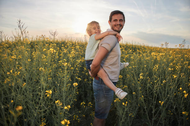 istock Father and daughter enjoying nature 1789160141