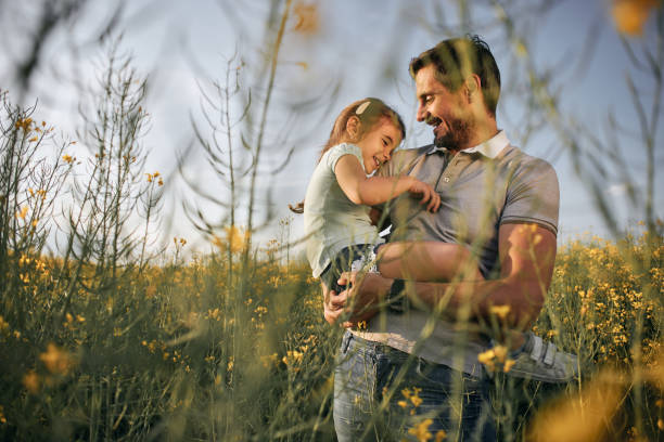 istock Father and daughter enjoying nature 1789162293