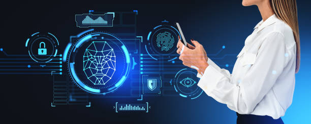 istock Businesswoman using smartphone, face recognition hologram and data security 1789166079