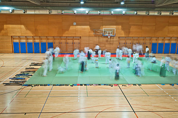 Aikido Practitioners Training in Sports Hall
