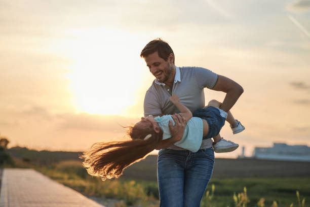 istock Father and daughter enjoying nature 1789171544