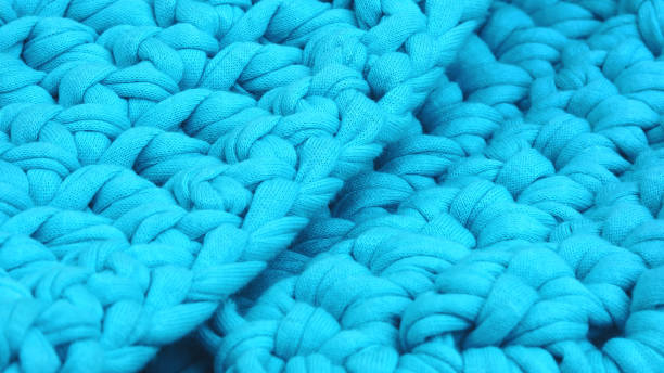 istock Blue voluminous knitted background and texture. 1789183736