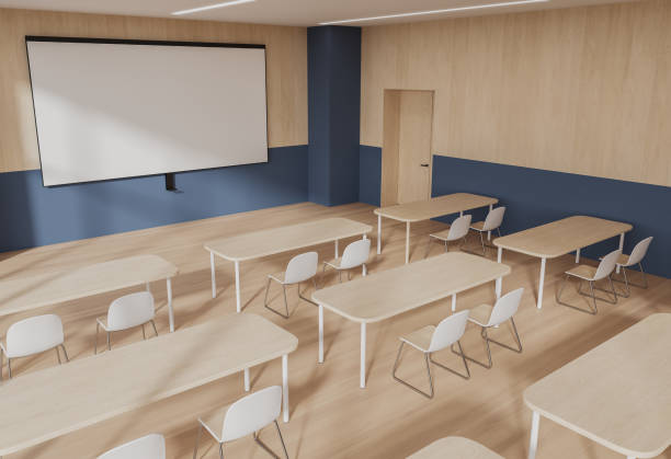 istock Top view of school interior with table in row and mock up projection screen 1789186042