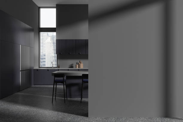 istock Gray kitchen interior with island and blank wall 1789190738