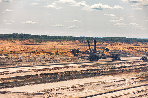 Digging excavators in a brown coal mine or lignite mine