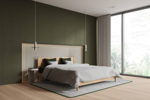 istock Green hotel bedroom interior with bed and decoration, panoramic window 1789198655