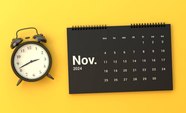 istock Alarm Clock And 2024 November Calendar On Yellow Background 1789209232