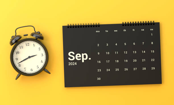 istock Alarm Clock And 2024 September Calendar On Yellow Background 1789209791