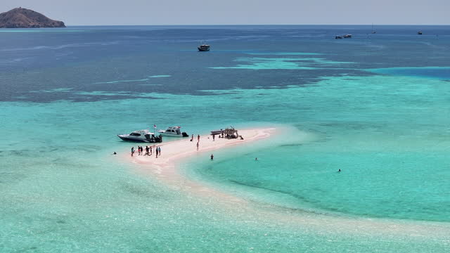 Aerial Drone Pulau karangan island, Beach on Sea in Komodo National Park, Flores Sea, Indonesia