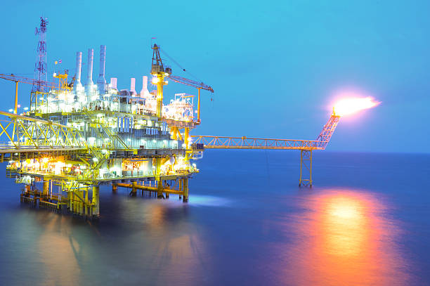 istock Oil and gas platform on sunrise time 178922576