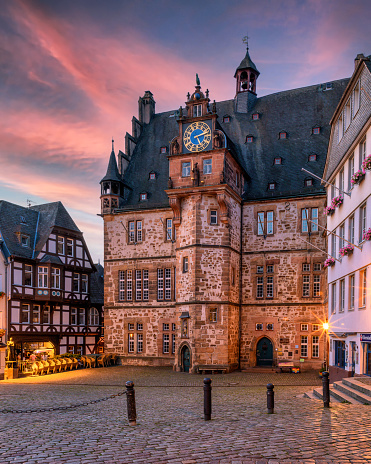 Beautiful view of the medieval building of the Town Hall of Marburg, Hesse, Germany at the sunrise