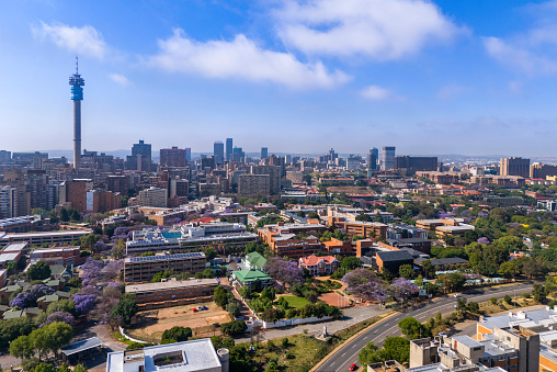 Johannesburg Cityscape seen with the historic Parktown Mansions, Hazeldene Hall and The View, in the forefront.