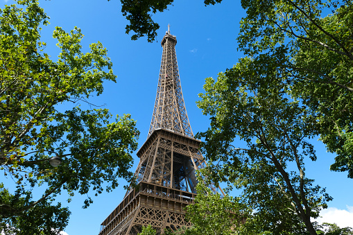 Paris, France. August 06. 2023. View on historic monument with frame of vegetation.