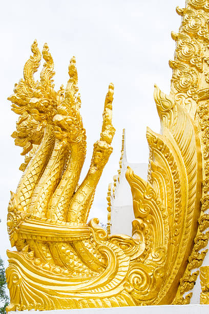 istock Thai dragon, golden Naga statue in temple 178927937