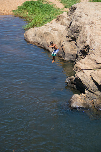 Brazilian people have fun at beautiful river on September, 2023, Pirenopolis, Brazil.
