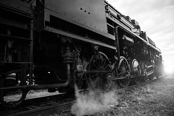 istock steam locomotive heading towards sunset 178928329