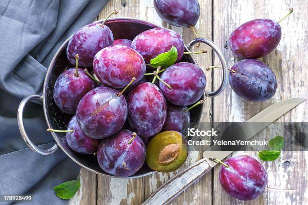 Plums Stock Photo - Download Image Now - Plum, Wood - Material, Eating