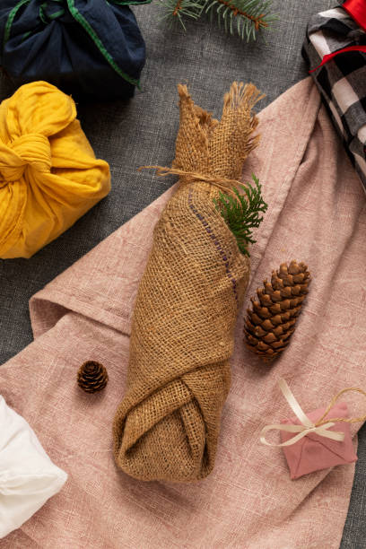 istock Bottle of alcohol or wine wrapped in fabric. 1789295058