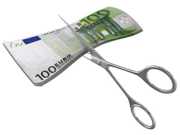 preço do orçamento de corte de dinheiro do euro - cutting currency scissors home finances - fotografias e filmes do acervo