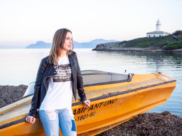 istock Girl sitting n the Beach 1789302370