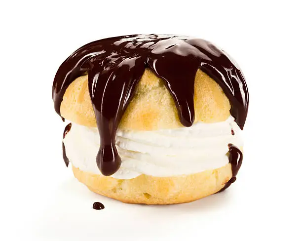 A profiterole or creampuff (in French choux à la crème) is a choux pastry puff ball filled with whipped cream or pastry cream. They are frequently topped with chocolate ganache.