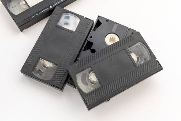 istock Old video cassette tapes isolated in white. 1789345153