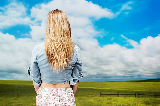 istock Rear view of a woman standing 178935417