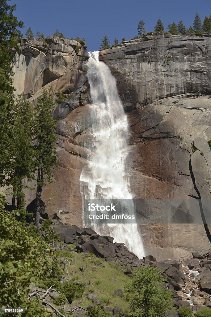 Nevada Falls, Yosemite National Park Nevada Falls is one of the two primary waterfalls along the Mist Trail at the East end of Yosemite Valley. Blue Stock Photo