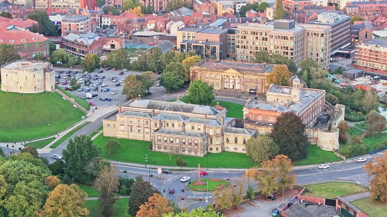 Zoomed drone lifting shot of the historical buildings in the city of York in the United Kingdom.