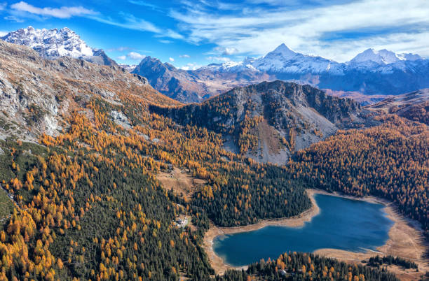 View on Obersee lake and mountains above Defereggental valley on a summer day,mountains, sky, clouds.  Alps, Austria.