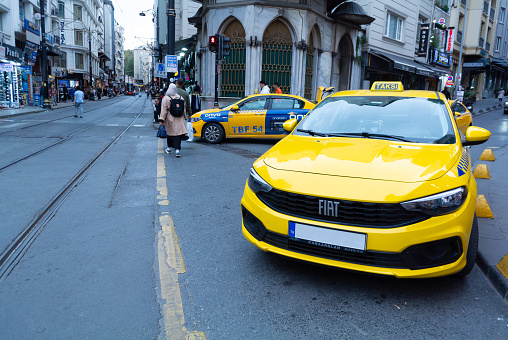 Istanbul, Turkey, 9th of October 2023, Yellow taxi in the street of Istanbul.