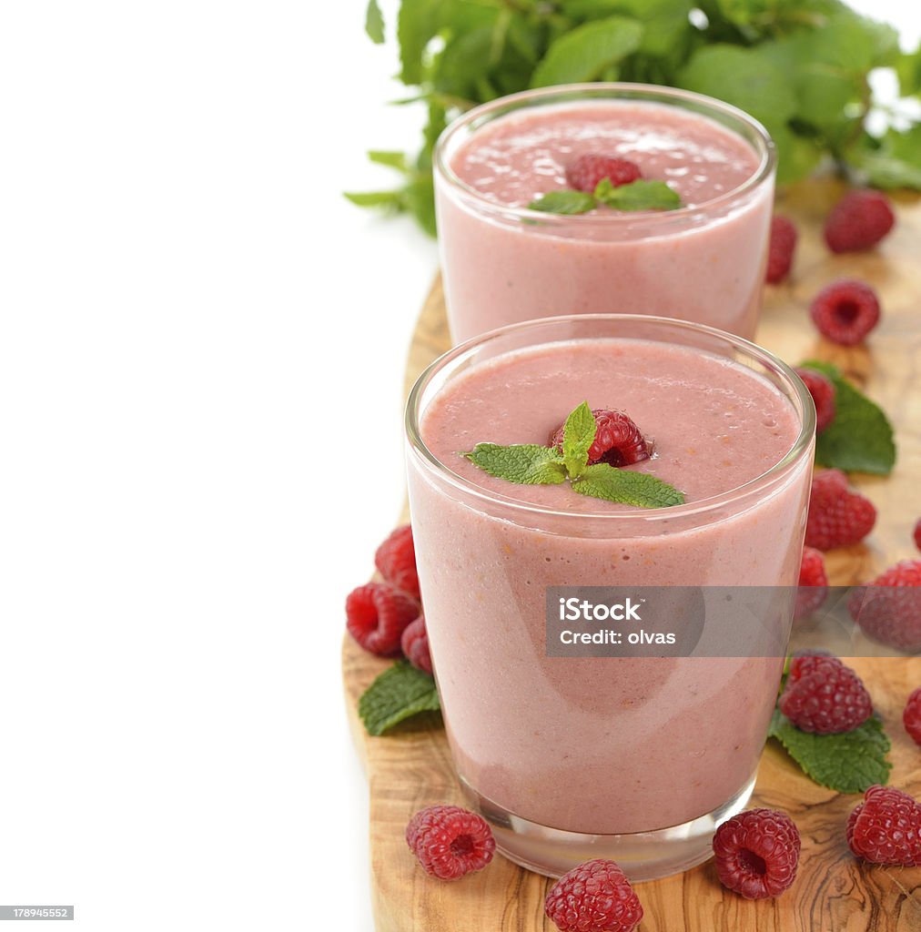 Raspberry smoothie Raspberry smoothie on a white background Brown Stock Photo