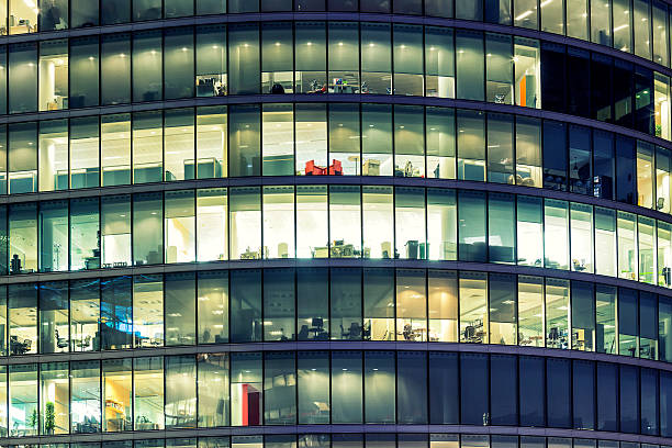 istock Illuminated office buildings in London 178945629