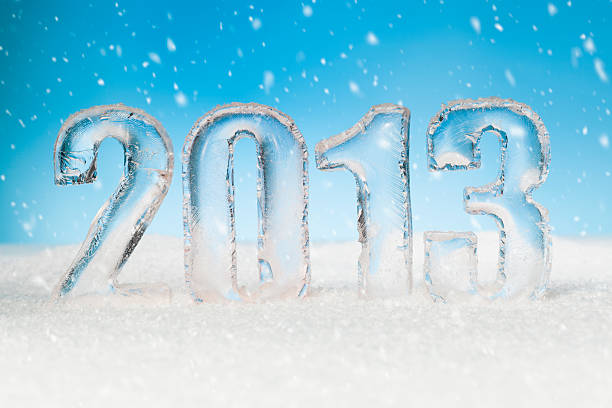 istock Year 2013 cut from ice on snow blue sunny background 178947748