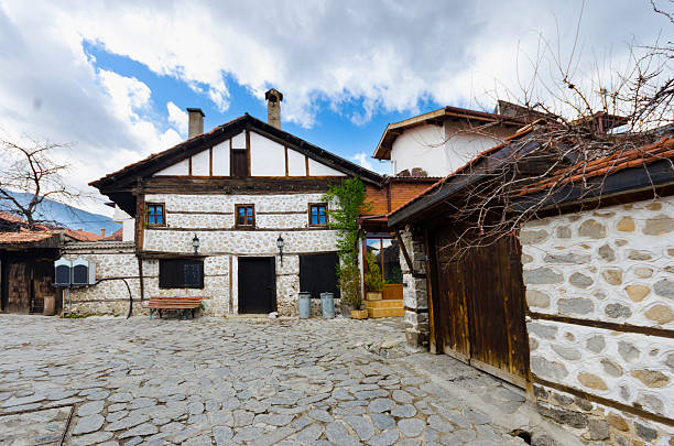istock old architecture houses and stone paved road, Bansko, Bulgaria 178950706