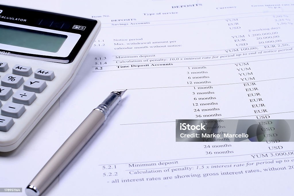 Calculation Calculation of income, taxes and bank credit rates Financial Advisor Stock Photo